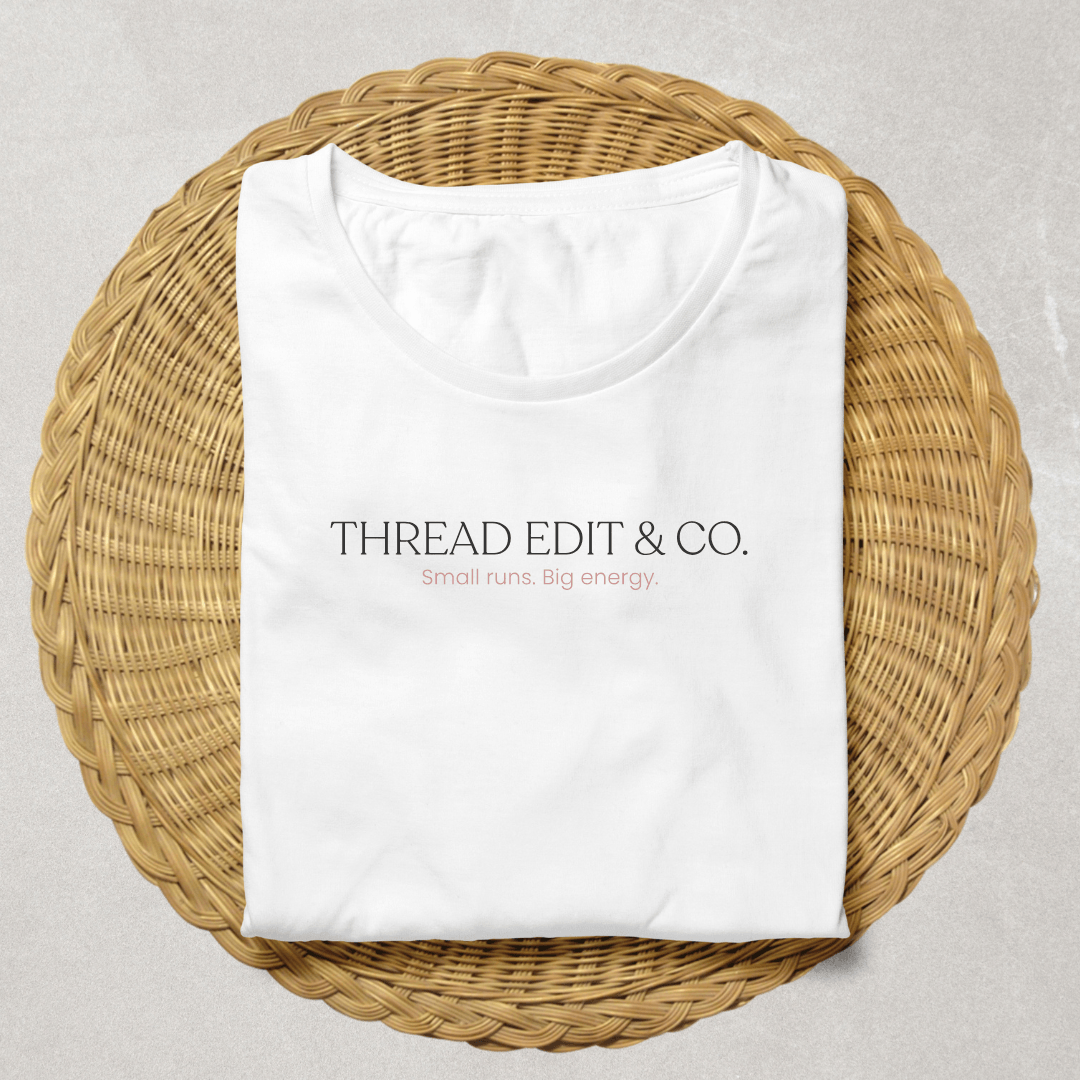 Folded white custom t-shirt with 'THREAD EDIT & CO. Small runs. Big energy.' text, part of Secure Tee Deposit - Custom Design | Quick Mockup, 48hr Proof.